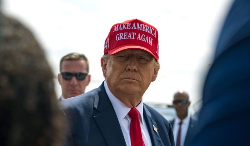 ATLANTA, GEORGIA - APRIL 10: Former U.S. President Donald Trump speaks to the media as he arrives at the Atlanta Airport on April 10, 2024 in Atlanta, Georgia. Trump is visiting Atlanta for a campaign fundraising event he is hosting. (Photo by Megan Varner/Getty Images)