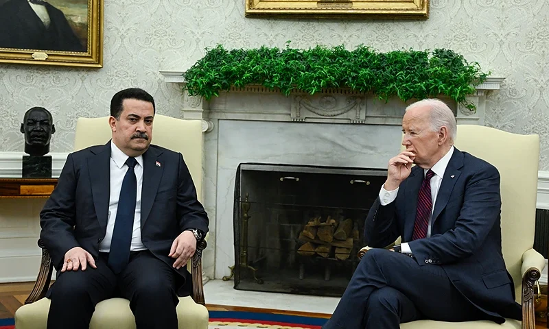 US President Joe Biden meets with the Prime Minister of Iraq Mohammed Shia al-Sudani in the Oval Office of the White House in Washington, DC, on April 15, 2024. Sudani's trip to Washington, his first since taking office in October 2022, was originally expected to focus on the presence of US troops in Iraq as part of an anti-jihadist coalition. But the meeting will now be dominated by the fractious situation in the region after Iraq's neighbor Iran launched a massive missile and drone assault on Israel on April 13, 2024. (Photo by ANDREW CABALLERO-REYNOLDS / AFP) (Photo by ANDREW CABALLERO-REYNOLDS/AFP via Getty Images)