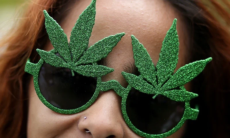 People celebrate 420 at Washington Square Park in New York City on April 20, 2024. April 20 is an unofficial international counterculture celebration of cannabis. (Photo by Leonardo Munoz / AFP) (Photo by LEONARDO MUNOZ/AFP via Getty Images)