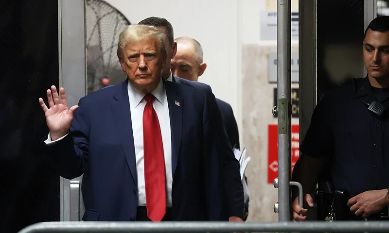 NEW YORK, NEW YORK - APRIL 25: Former President Donald Trump enters Manhattan Criminal Court for the continuation of his hush money trial on April 25, 2024 in New York City. Former U.S. President Donald Trump faces 34 felony counts of falsifying business records in the first of his criminal cases to go to trial. (Pool Photo by Spencer Platt/Getty Images)