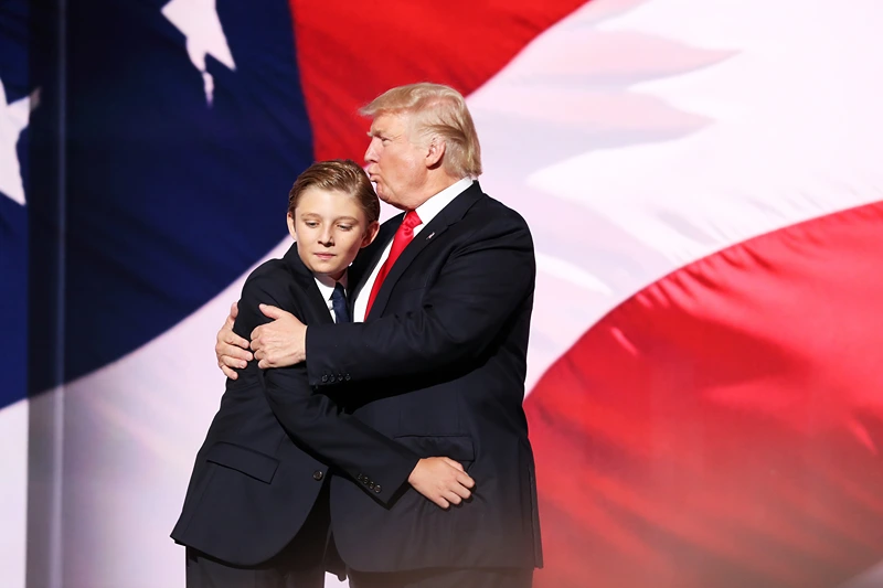 Republican National Convention: Day Four
CLEVELAND, OH - JULY 21: Republican presidential candidate Donald embraces his son Barron Trump after he delivered his speech on the fourth day of the Republican National Convention on July 21, 2016 at the Quicken Loans Arena in Cleveland, Ohio. Republican presidential candidate Donald Trump received the number of votes needed to secure the party's nomination. An estimated 50,000 people are expected in Cleveland, including hundreds of protesters and members of the media. The four-day Republican National Convention kicked off on July 18. (Photo by John Moore/Getty Images)