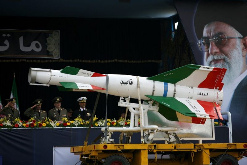 TEHRAN, IRAN - APRIL 17: An Iranian surface to surface Ghasedak missile is driven past portraits of Iran's late founder of the Islamic Republic, Ayatollah Ali khamenei (R), during the annual army day military parade on April 17, 2008 in Tehran, Iran. Ahmadinejad proclaimed today the country's army was a powerful deterrent to all enemies saying 