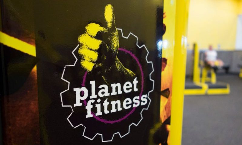 A woman leg lifts at Planet Fitness in the Columbia Mall on July 24, 2017 in Bloomsburg, Pennsylvania. - Mall space is being repurposed as more department store chains close stores that have traditionally served as "anchors" at malls. The Planet Fitness now occupies the space that was previously a Sears. Abandoned by the big brands, deserted by the young, the American mall, once temples of the shopping, have become ghost towns, victims of the explosion of online shopping. (Photo by Don EMMERT / AFP) / TO GO WITH AFP STORY by John BIERS, "Deserted, US shopping centers look for a future" (Photo by DON EMMERT/AFP via Getty Images)