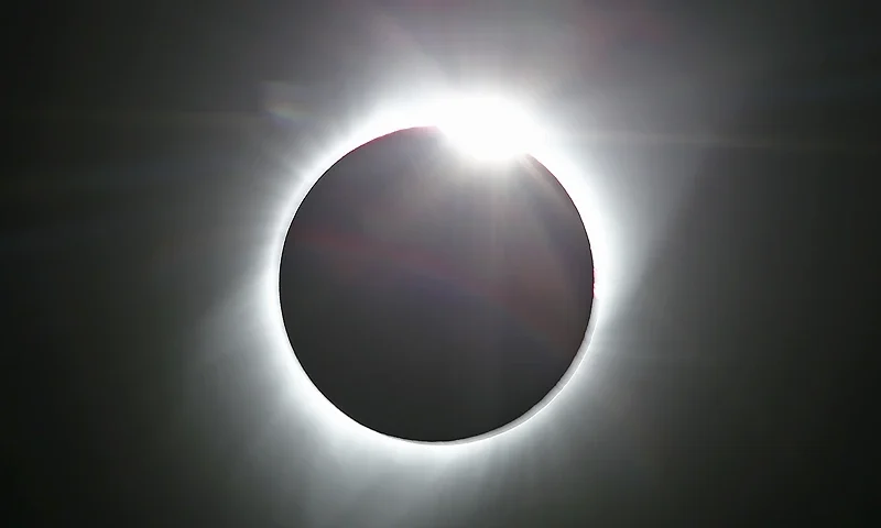 JACKSON, WY - AUGUST 21: The sun is partially eclipsed in the first phase of a total eclipse in Grand Teton National Park on August 21, 2017 outside Jackson, Wyoming. Thousands of people have flocked to the Jackson and Teton National Park area for the 2017 solar eclipse which will be one of the areas that will experience a 100% eclipse on Monday August 21, 2017. (Photo by George Frey/Getty Images)