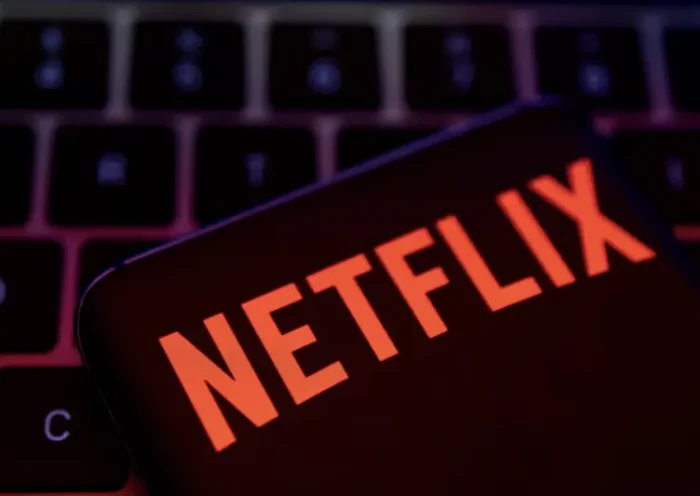 Smartphone with Netflix logo is placed on a keyboard in this illustration taken April 19, 2022. REUTERS/Dado Ruvic/File Photo
