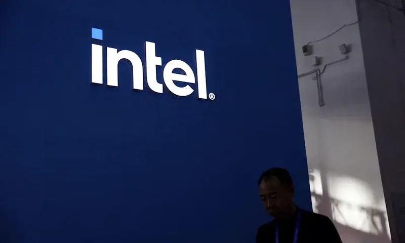 A man walks past the Intel logo at its booth during the first China International Supply Chain Expo (CISCE) in Beijing, China November 28, 2023. REUTERS/Florence Lo/File Photo