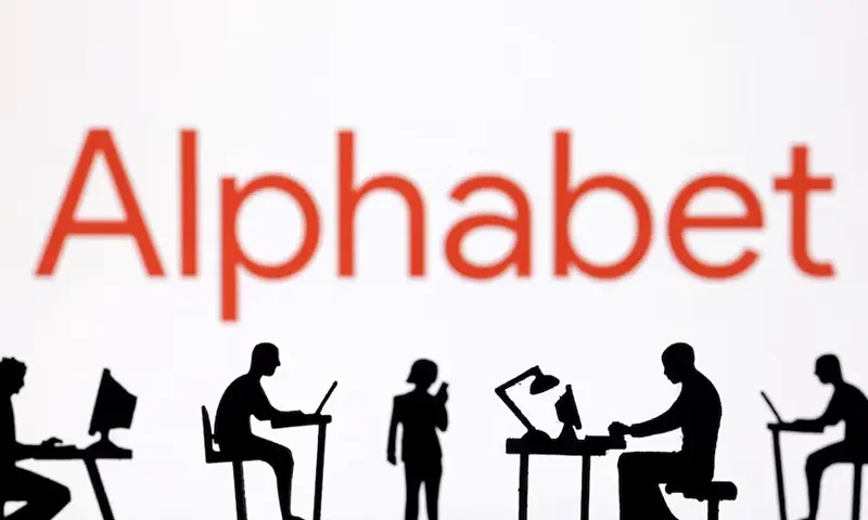 Figurines with computers and smartphones are seen in front of Alphabet logo in this illustration taken, February 19, 2024. REUTERS/Dado Ruvic/Illustration