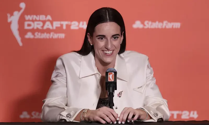 Caitlin Clark speaks in a press conference after she is selected with the number one overall pick to the Indiana Fever n the 2024 WNBA Draft at Brooklyn Academy of Music. Mandatory Credit: Vincent Carchietta-USA TODAY Sports