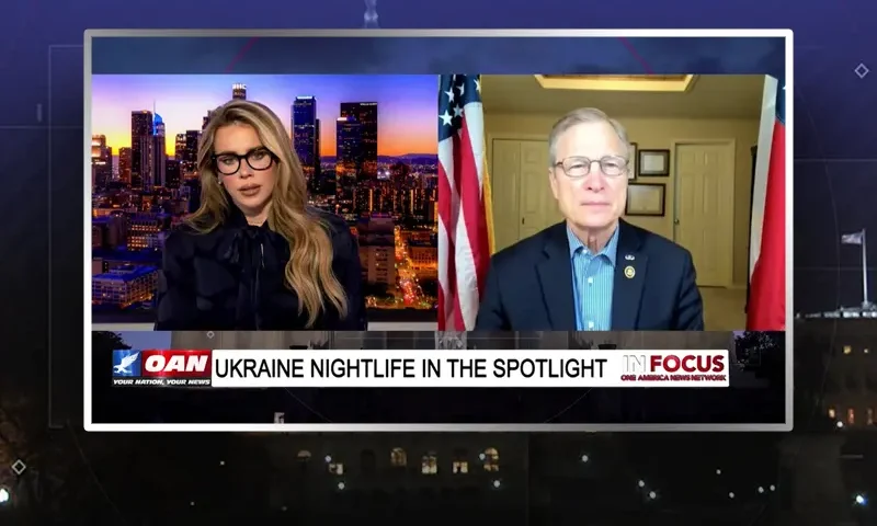 Video still from In Focus on One America News Network showing a split screen of the host on the left side, and on the right side is the guest, Rep. Brian Babin.