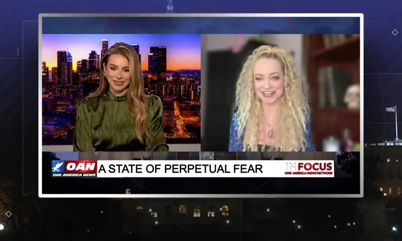 Video still from In Focus on One America News Network showing a split screen of the host on the left side, and on the right side is the guest, Mindy Robinson.