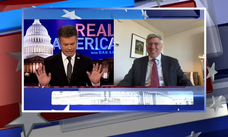Video still from Real America on One America News Network showing a split screen of the host on the left side, and on the right side is the guest, Steve Moore.