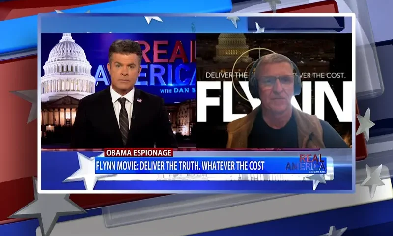 Video still from Real America on One America News Network showing a split screen of the host on the left side, and on the right side is the guest, General Michael Flynn.