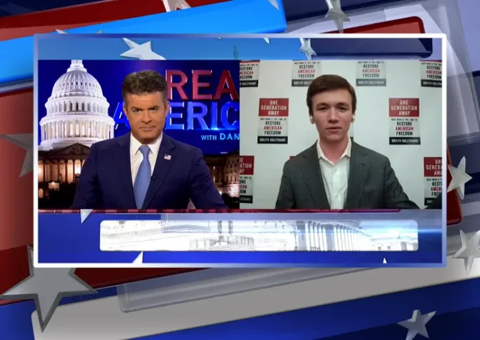 Video still from Real America on One America News Network showing a split screen of the host on the left side, and on the right side is the guest, Brilyn Hollyhand.