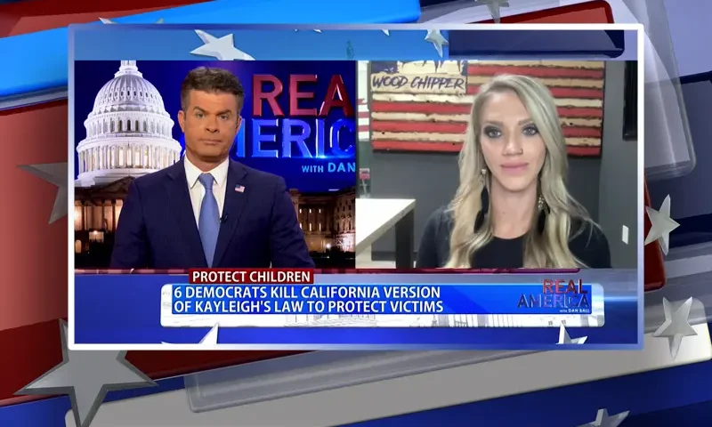Video still from Real America on One America News Network showing a split screen of the host on the left side, and on the right side is the guest, Kayleigh Kozak.