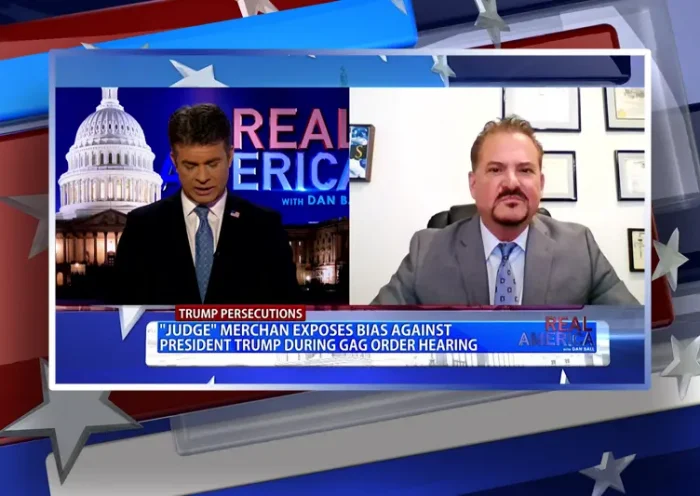 Video still from Real America on One America News Network showing a split screen of the host on the left side, and on the right side is the guest, David Wohl.