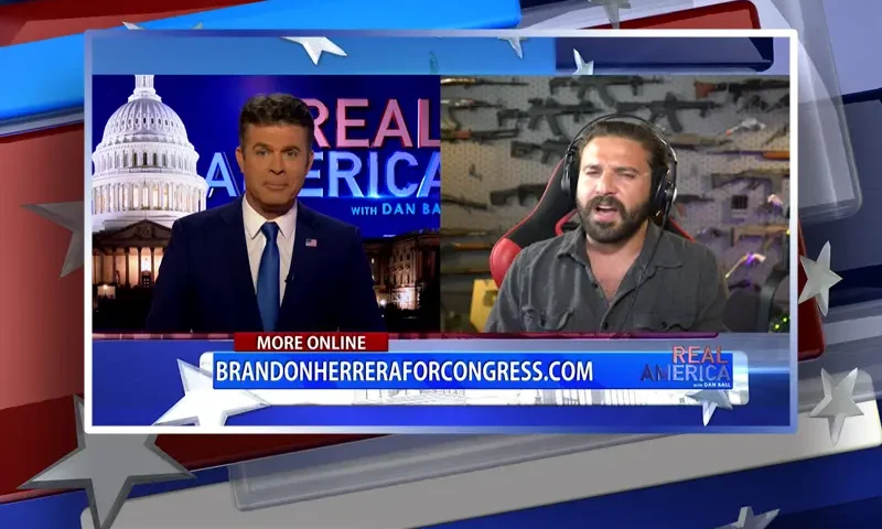 Video still from Real America on One America News Network showing a split screen of the host on the left side, and on the right side is the guest, Brandon Herrera.