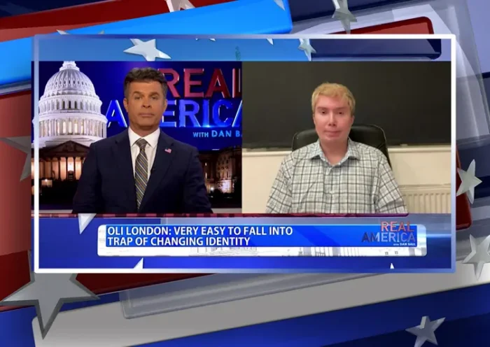 Video still from Real America on One America News Network showing a split screen of the host on the left side, and on the right side is the guest, Oli London.