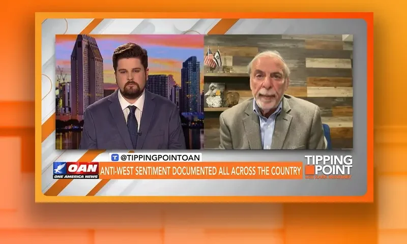 Video still from Tipping Point on One America News Network showing a split screen of the host on the left side, and on the right side is the guest, Dov Hikind.