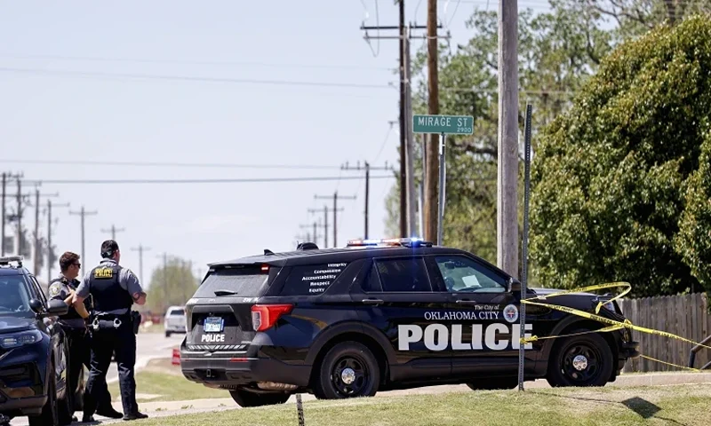 of 2 | Police investigate after people were found dead in a home in Oklahoma City on Monday, April 22, 2024. Oklahoma City police called to a home on the city's southwest side Monday discovered the bodies of five people, including at least two children, authorities said. (Nathan J. Fish/The Oklahoman via AP)