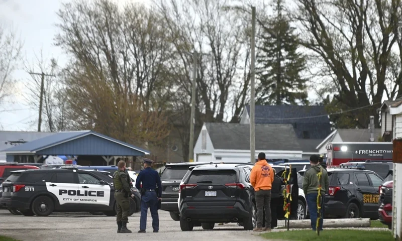 Authorities respond to the Swan Creek Boat Club after a driver crashed a vehicle through a building where a children’s birthday party was taking place, Saturday, April 20, 2024, in Berlin Township, Mich. (Kathleen Kildee/Detroit News via AP)