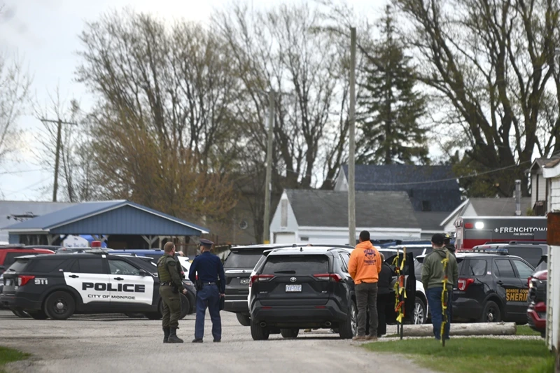 Authorities respond to the Swan Creek Boat Club after a driver crashed a vehicle through a building where a children’s birthday party was taking place, Saturday, April 20, 2024, in Berlin Township, Mich. (Kathleen Kildee/Detroit News via AP)