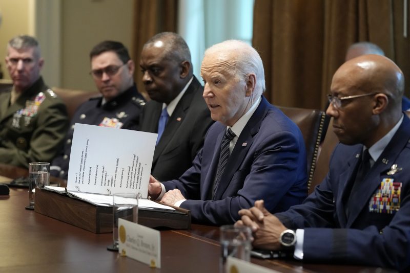 President Joe Biden speaks at the beginning of his meeting with the Combatant Commanders in the Cabinet Room of the White House in Washington, Wednesday, May 15, 2024, before hosting them for a dinner. At right is Chairman of the Joint Chiefs of Staff Air Force Gen. CQ Brown. (AP Photo/Susan Walsh)