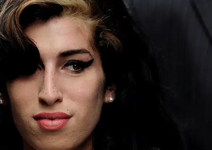 British singer Amy Winehouse arrives at Westminster Magistrates Court in central London July 23, 2009. REUTERS/Toby Melville/File Photo
