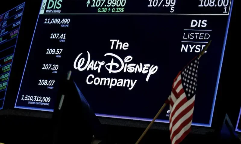 A screen shows the logo and a ticker symbol for The Walt Disney Company on the floor of the New York Stock Exchange (NYSE) in New York, U.S., December 14, 2017. REUTERS/Brendan McDermid/File Photo