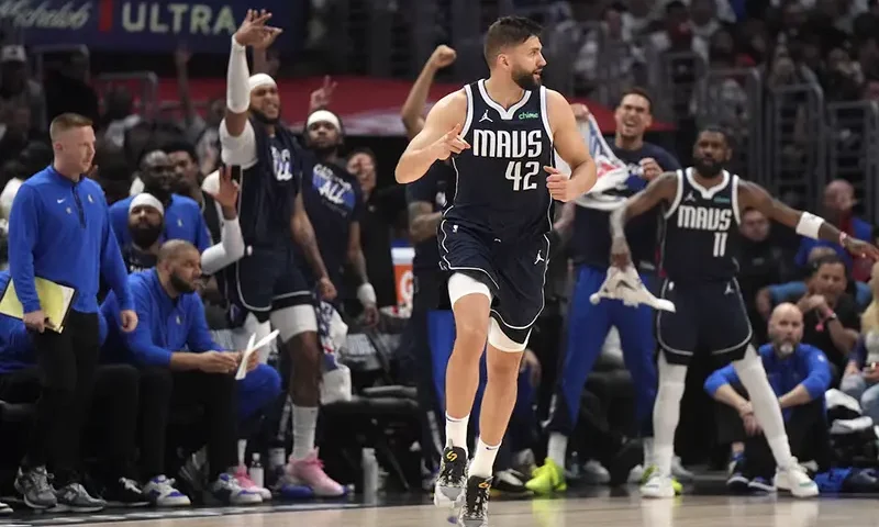 Dallas Mavericks forward Maxi Kleber (42) celebrates against the LA Clippers in the first half during game five of the first round for the 2024 NBA playoffs at Crypto.com Arena. Mandatory Credit: Kirby Lee-USA TODAY Sports
