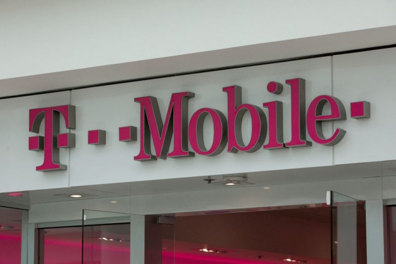 The T-Mobile logo is seen outside a shop in Washington, DC, on July 26, 2019. - US antitrust authorities approved the USD 26 billion merger of T-Mobile and Sprint in a deal that brings together the third- and fourth-largest wireless operators as the industry moves toward deployment of superfast 5G networks. (Photo by Alastair Pike / AFP) (Photo by ALASTAIR PIKE/AFP via Getty Images)