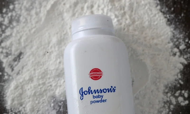 Johnson & Johnson Voluntarily Recalls Baby Powder For Asbestos Contamination SAN ANSELMO, CALIFORNIA - OCTOBER 18: In this photo illustration, a container of Johnson's baby powder made by Johnson and Johnson sits on a table on October 18, 2019 in San Anselmo, California. Johnson & Johnson, the maker of Johnson's baby powder, announced a voluntary recall of 33,000 bottles of baby powder after federal regulators found trace amounts of asbestos in a single bottle of the product. (Photo Illustration by Justin Sullivan/Getty Images)
