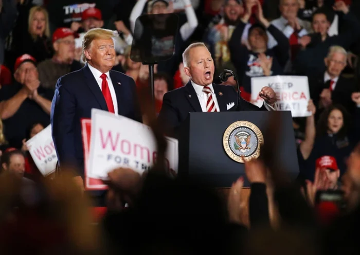 WILDWOOD, NEW JERSEY - JANUARY 28: U.S. Congressman Jeff Van Drew joins President Donald Trump at an evening “Keep America Great Rally” at the Wildwood Convention Center on January 28, 2020 in Wildwood, New Jersey. Trump was in the Southern New Jersey town to show support for Democrat-turned-Republican U.S. Congressman Jeff Van Drew. Some supporters of the president have waited in line since Monday morning. (Photo by Spencer Platt/Getty Images)