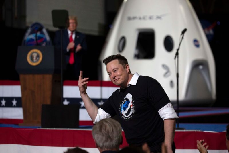 CAPE CANAVERAL, FLORIDA - MAY 30: U.S. President Donald Trump acknowledges SpaceX founder Elon Musk (R) after the successful launch of the SpaceX Falcon 9 rocket with the manned Crew Dragon spacecraft at the Kennedy Space Center on May 30, 2020 in Cape Canaveral, Florida. Earlier in the day NASA astronauts Bob Behnken and Doug Hurley lifted off on the inaugural flight and will be the first people since the end of the Space Shuttle program in 2011 to be launched into space from the United States. (Photo by Saul Martinez/Getty Images)