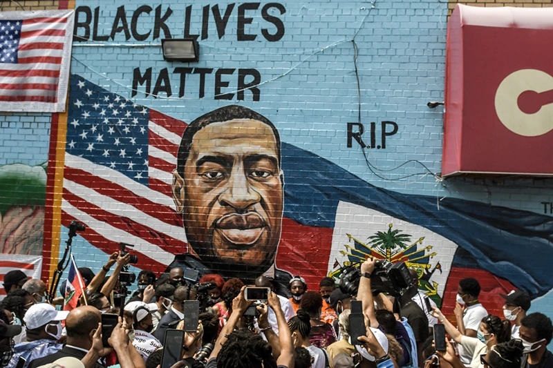 George Floyd's Brother Attends Unveiling Of Memorial Portrait In Brooklyn
NEW YORK, NY - JULY 13: A mural painted by artist Kenny Altidor depicting George Floyd is unveiled on a sidewall of CTown Supermarket on July 13, 2020 in the Brooklyn borough New York City. George Floyd was killed by a white police officer in Minneapolis and his death has sparked a national reckoning about race and policing in the United States. (Photo by Stephanie Keith/Getty Images)