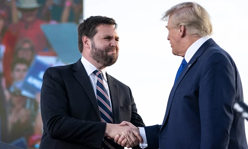Former President Trump Holds Rally In Ohio Ahead Of State's Primary DELAWARE, OH - APRIL 23: (L-R) J.D. Vance, a Republican candidate for U.S. Senate in Ohio, shakes hands with former President Donald Trump during a rally hosted by the former president at the Delaware County Fairgrounds on April 23, 2022 in Delaware, Ohio. Last week, Trump announced his endorsement of J.D. Vance in the Ohio Republican Senate primary. (Photo by Drew Angerer/Getty Images)