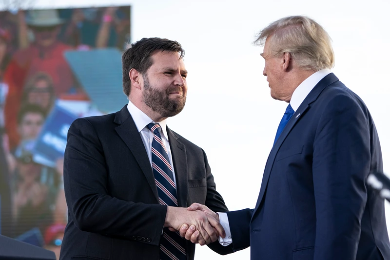 Former President Trump Holds Rally In Ohio Ahead Of State's Primary
DELAWARE, OH - APRIL 23: (L-R) J.D. Vance, a Republican candidate for U.S. Senate in Ohio, shakes hands with former President Donald Trump during a rally hosted by the former president at the Delaware County Fairgrounds on April 23, 2022 in Delaware, Ohio. Last week, Trump announced his endorsement of J.D. Vance in the Ohio Republican Senate primary. (Photo by Drew Angerer/Getty Images)