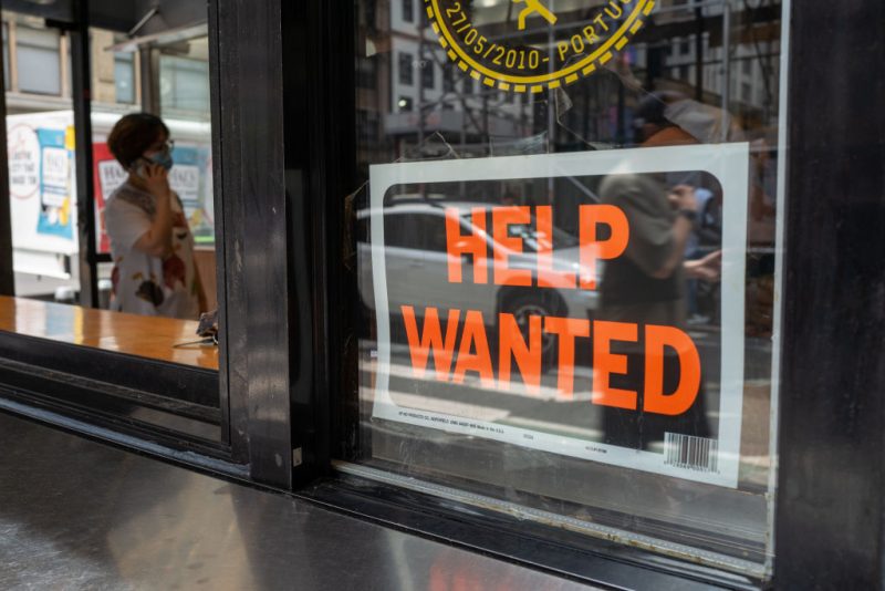 NEW YORK, NEW YORK - JULY 28: A "help wanted" sign is displayed in a window in Manhattan on July 28, 2022 in New York City. The Commerce Department said on Thursday that the nation's Gross Domestic Product (GDP) fell 0.2 percent in the second quarter. With two GDP declines in a row, many economists fear that the United States could be entering a recession. (Photo by Spencer Platt/Getty Images