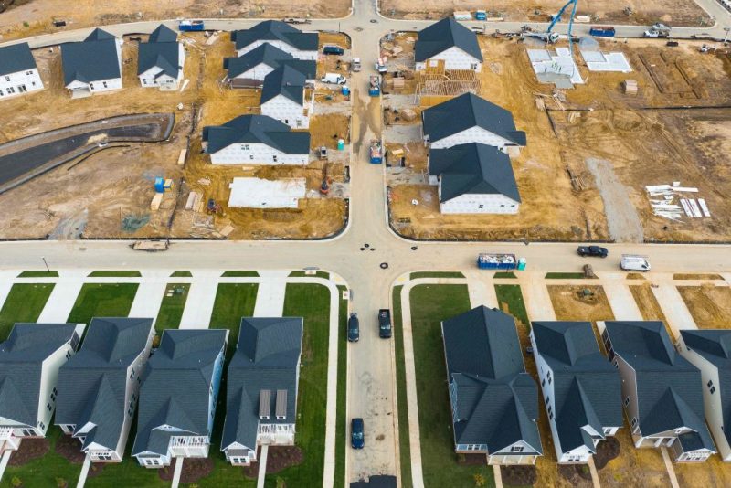 In this aerial view, completed and under construction new homes at a site in Trappe, Maryland, on October 28, 2022. - New home sales in the US dipped in September, official data showed on October 26, 2022, as worsening affordability nudges ownership further out of reach for many. Sales soared during the coronavirus pandemic as Americans snapped up homes on the back of bargain mortgage rates, but the sector has cooled with the US Federal Reserve hiking lending rates as it fights to bring down surging inflation. (Photo by Jim WATSON / AFP) (Photo by JIM WATSON/AFP via Getty Images)