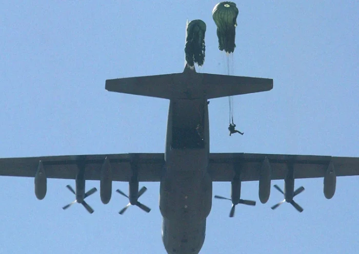 US and Philippine paratroopers jump off from US Air Force MC-130 plane during the joint US-Philippine military exercise codename "Balanced Piston" at the Clark Airbase, former American military base in northern Pampanga province 27 January 2003. Hundreds of US troops are participating in the joint military exercise while US militlary advisers will conduct a separate counter terrorism training for Filipino soldiers in southern Philippines next week. AFP PHOTO (Photo by AFP) (Photo by -/AFP via Getty Images)