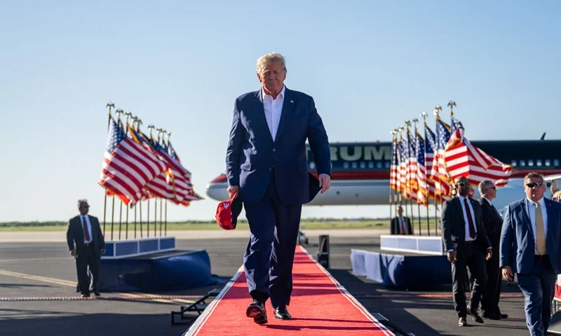 WACO, TEXAS - MARCH 25: Former U.S. President Donald Trump arrives during a rally at the Waco Regional Airport on March 25, 2023 in Waco, Texas. Former U.S. president Donald Trump attended and spoke at his first rally since announcing his 2024 presidential campaign. Today in Waco also marks the 30 year anniversary of the weeks deadly standoff involving Branch Davidians and federal law enforcement. 82 Davidians were killed, and four agents left dead. (Photo by Brandon Bell/Getty Images)