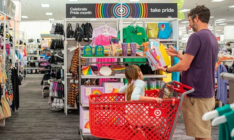 Businesses Across U.S. Weave Pride Themes Into Marketing Campaigns AUSTIN, TEXAS - JUNE 06: A customer shops through Pride Month accessories at a Target store on June 06, 2023 in Austin, Texas. Businesses across the United States have begun advertising LGBTQIA+ apparel to mark this year's Pride Month. (Photo by Brandon Bell/Getty Images)