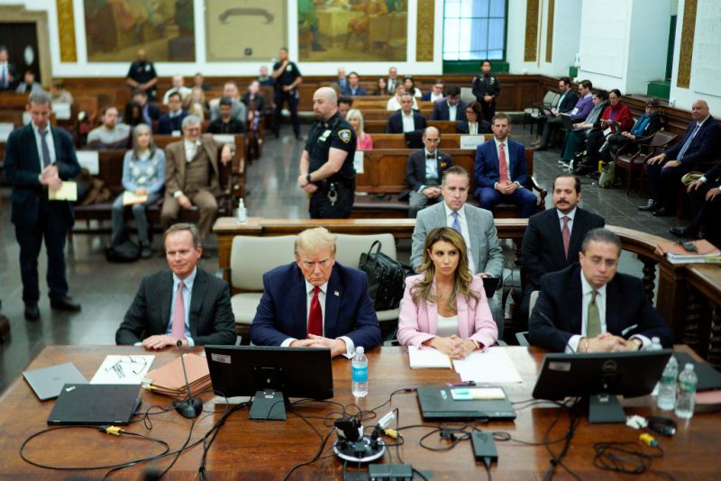 NEW YORK, NEW YORK - DECEMBER 7: Former U.S. President Donald Trump sits at the defense table with his attorneys Christopher Kise (L) and Alina Habba (2nd-R) in New York State Supreme Court on December 7, 2023 in New York City. Trump's civil fraud trial alleges that he and his two sons Donald Trump Jr. and Eric Trump conspired to inflate his net worth on financial statements provided to banks and insurers to secure loans. New York Attorney General Letitia James has sued seeking $250 million in damages. (Photo by Eduardo Munoz Alvarez-Pool/Getty Images)