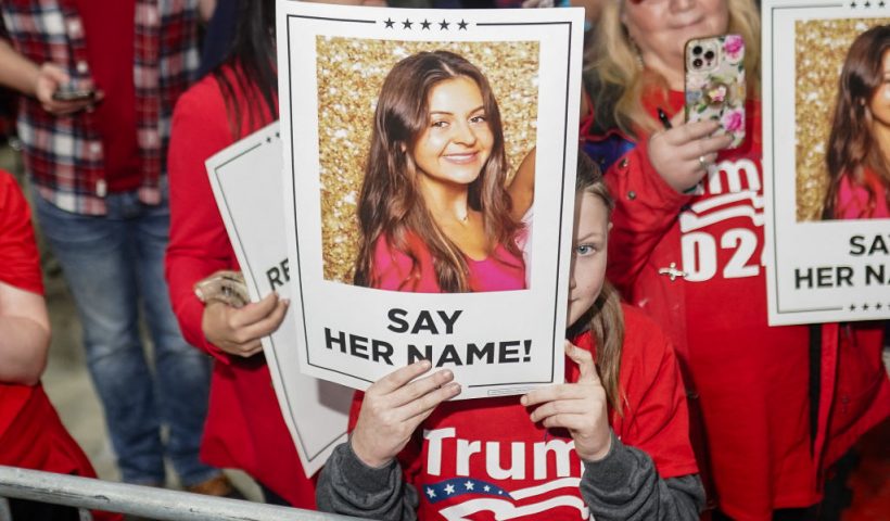 Supporters of former US President and 2024 presidential hopeful Donald Trump hold images of Laken Riley before he speaks at a "Get Out the Vote" rally in Rome, Georgia, on March 9, 2024. Riley, a nursing student, has become the face of immigration reform after her murder allegedly by an illegal immigrant on February 22, 2024. (Photo by Elijah Nouvelage / AFP) (Photo by ELIJAH NOUVELAGE/AFP via Getty Images)