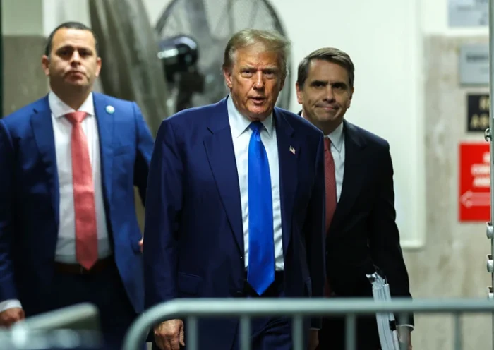 NEW YORK, NEW YORK - MAY 3: Former U.S. President Donald Trump returns to the courtroom following a break in his trial for allegedly covering up hush money payments at Manhattan Criminal Court on May 3, 2024 in New York City. Trump was charged with 34 counts of falsifying business records last year, which prosecutors say was an effort to hide a potential sex scandal, both before and after the 2016 presidential election. Trump is the first former U.S. president to face trial on criminal charges. (Photo by Charly Triballeau-Pool/Getty Images)