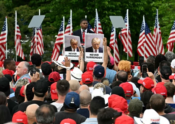 Supporters of former US President Donald Trump attend a campaign rally at Crotona Park in the South Bronx, New York City on May 23, 2024. (Photo by Jim WATSON / AFP) (Photo by JIM WATSON/AFP via Getty Images)
