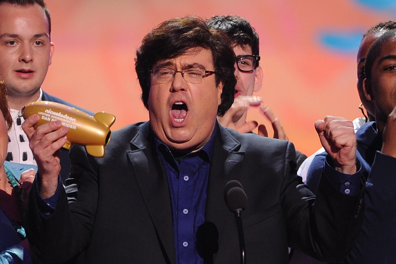 Nickelodeon's 27th Annual Kids' Choice Awards - Show
LOS ANGELES, CA - MARCH 29: Writer/producer Dan Schneider (C) accepts the Lifetime Achievement Award onstage with actors Maree Cheatham and Christopher Massey onstage during Nickelodeon's 27th Annual Kids' Choice Awards held at USC Galen Center on March 29, 2014 in Los Angeles, California. (Photo by Kevin Winter/Getty Images)