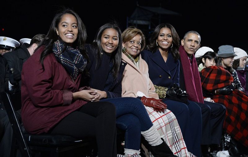 WASHINGTON, DC - DECEMBER 02: Malia Obama, Sasha Obama, mother-in-law Marian Robinson, first lady Michelle Obama and President Barack Obama attend the national Christmas tree lighting ceremony on the Ellipse south of the White House December 3, 2015 in Washington, DC. The lighting of the tree is an annual tradition attended by the president and the first family. (Photo by Olivier Douliery- Pool/Getty Images)