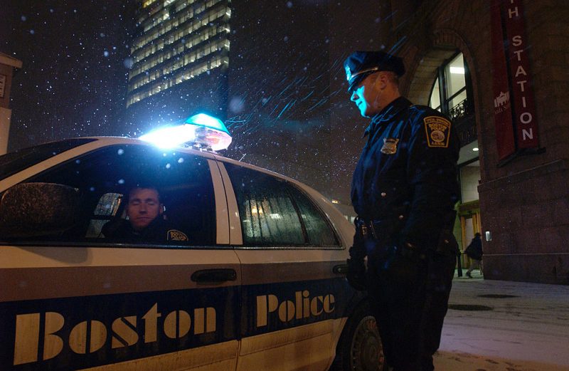 BOSTON - JANUARY 19: Boston Police officers Dennis Murphy (L) and Billy Cloran (R) patrol outside the South Station train station during an alert for a possible terror threat January 19, 2005 in Boston, Massachusetts. Federal agents have told local Massachusetts authorities that four people wanted for questioning in connection with a possible terrorist threat may have illegally entered the U.S. from Mexico, headed for Boston. (Photo by Jodi Hilton/Getty Images)