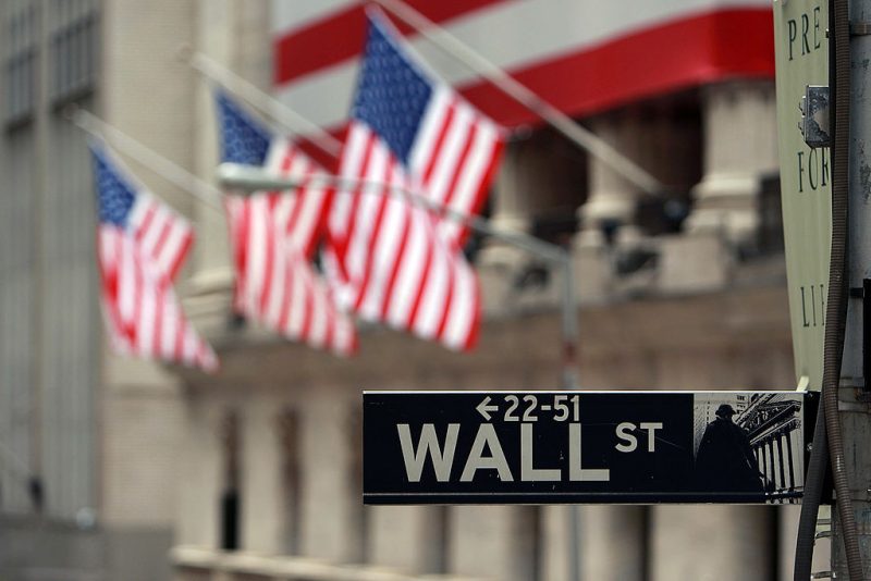 NEW YORK - SEPTEMBER 16: A Wall St. sign next to the New York Stock Exchange (NYSE) September 16, 2008 in New York City. U.S. stocks continued to drop Tuesday morning for the second consecutive day, following yesterday's Dow Jones Industrial Average plunge of 4.4% or 504 points, being the worst single day loss since the terrorist attacks of September 2001. Today the Federal Reserve is scheduled to announce the target interest rates for the federal funds. It's not clear how the central bank will respond to recent turmoil in the world's financial markets. This comes after news of Merrill Lynch & Co. Inc selling itself to Bank of America Corp, the financial firm Lehman Brothers Holdings Inc. filing for Chapter 11 bankruptcy protection, and insurance giant American International Group Inc. (AIG) attempting to raise capital to stay afloat. (Photo by Spencer Platt/Getty Images)