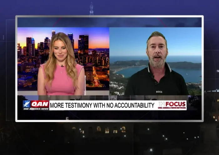 Video still from In Focus on One America News Network showing a split screen of the host on the left side, and on the right side is the guest, Jeff Berwick.